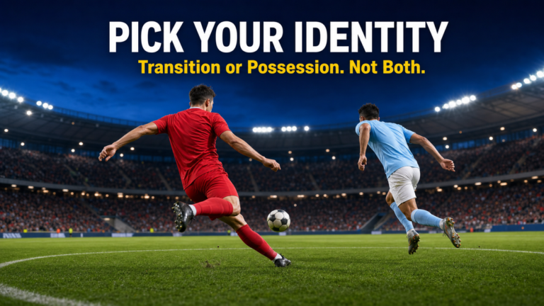 Game model identity moment showing a red-shirted player winning the ball as a pale-blue defender recovers in a floodlit stadium.
